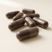 Daily Capsules — 60 ct — product texture close-up